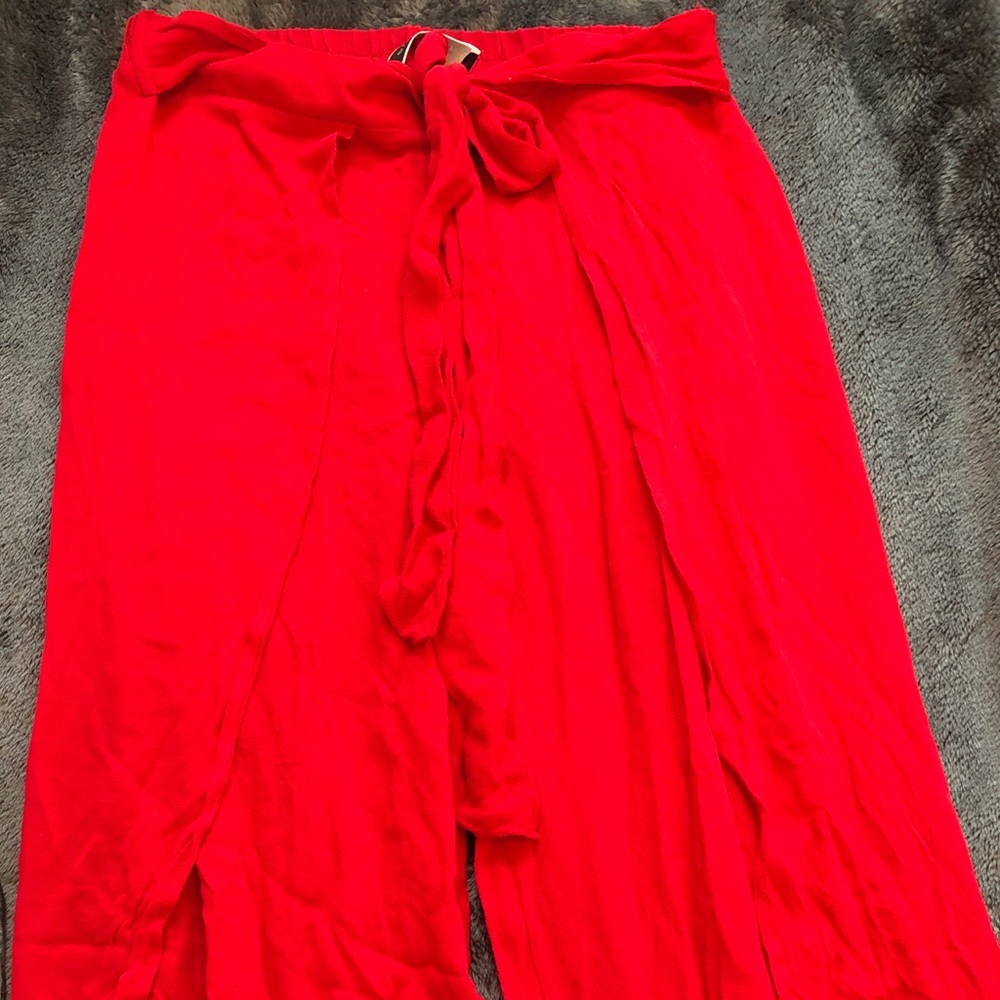 Never worn. Red flowy pants from Blue Blush.